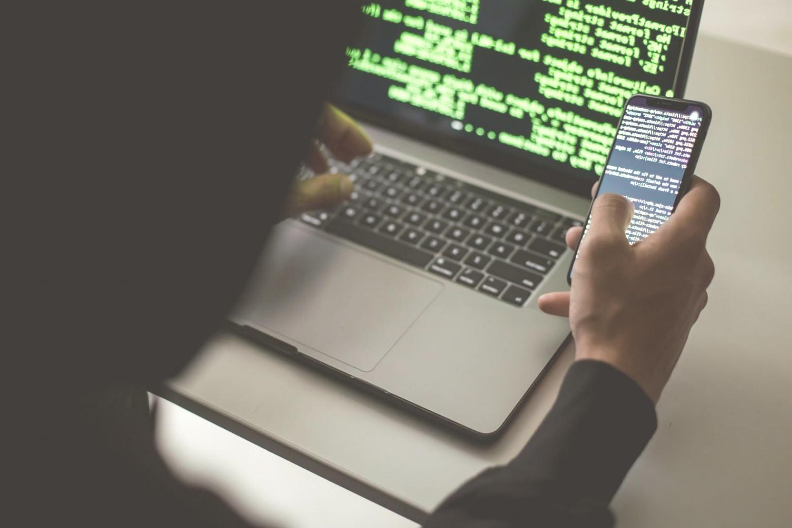 Students working on authentication projects in classroom environment