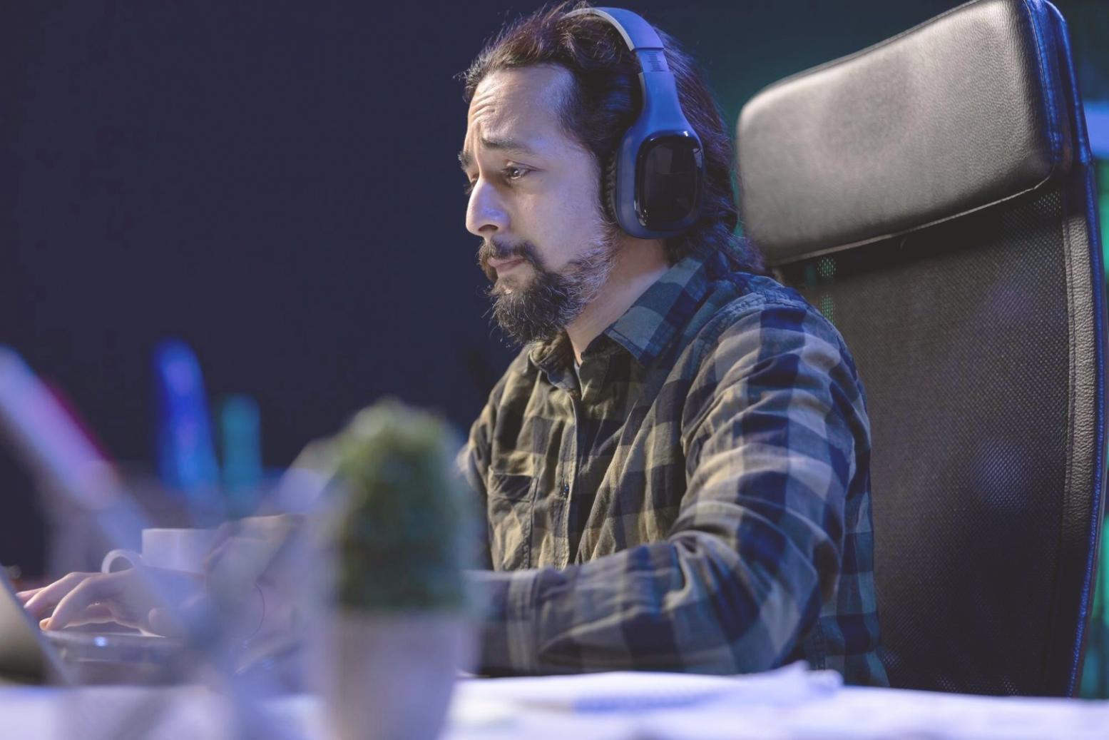 Workshop participants reviewing password hashing implementation on screens